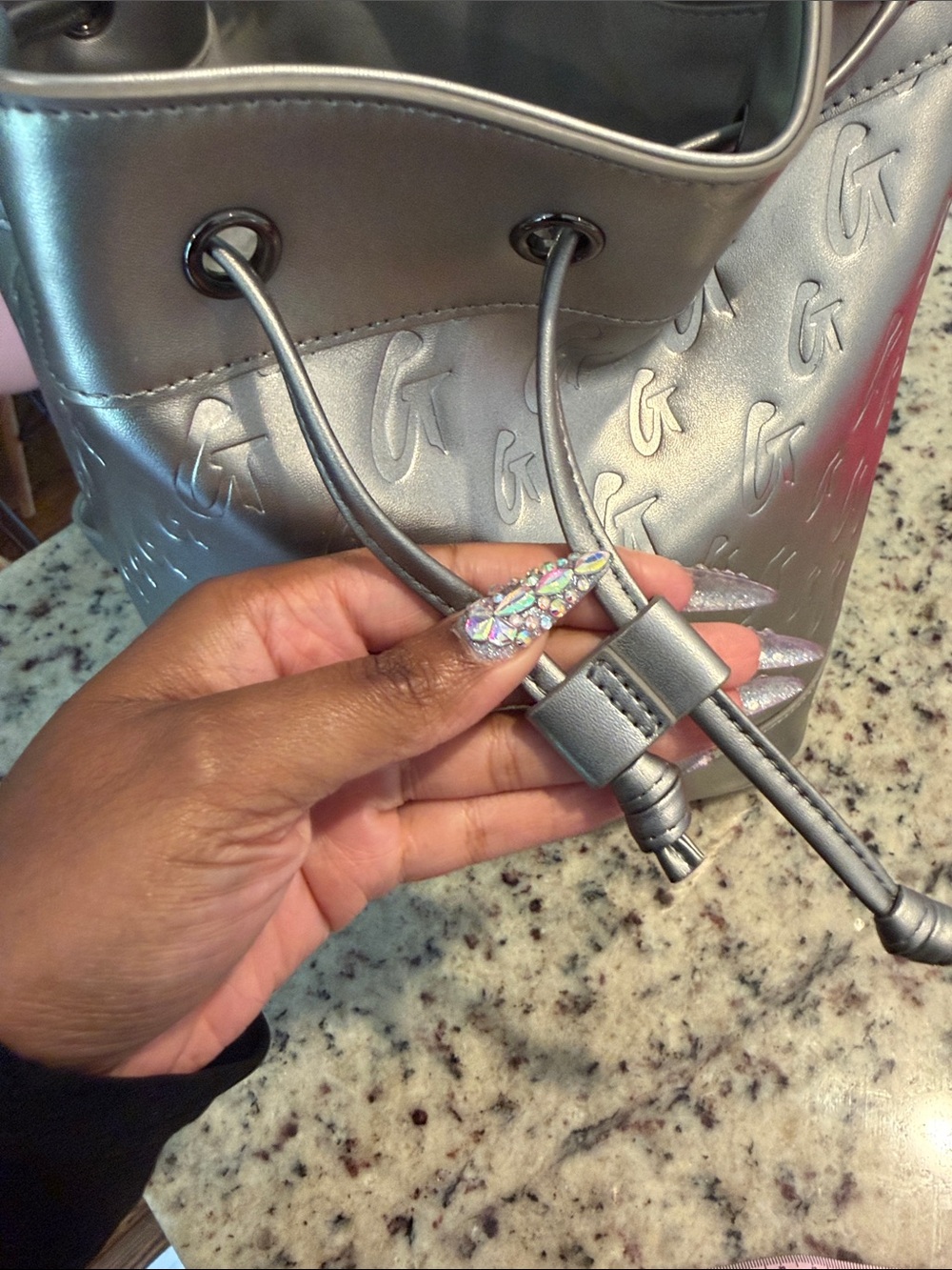 Glam-Aholic Monogram Metallic Silver Embossed Drawstring Bucket Shoulder Bag - Picture 8 of 15